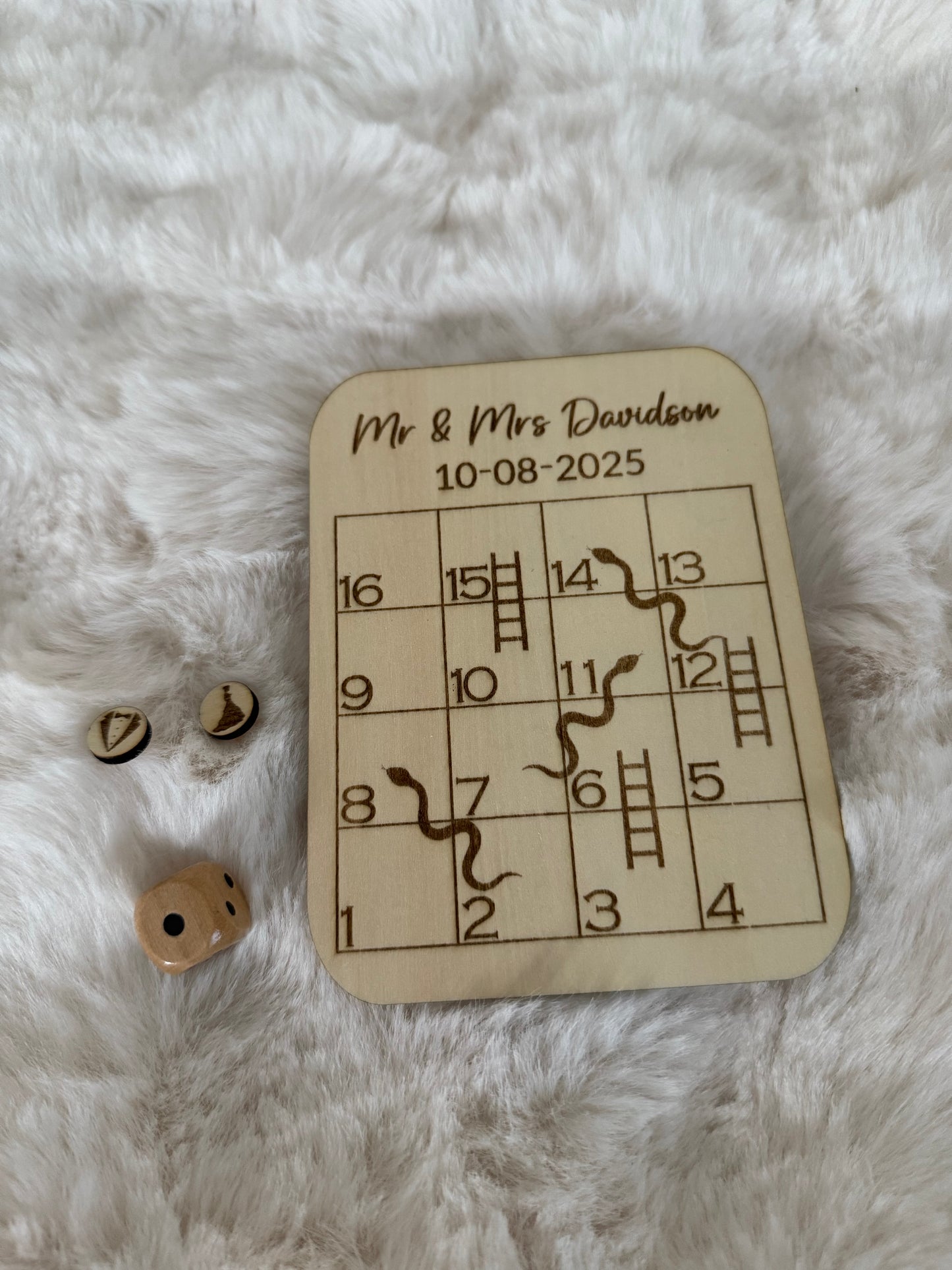 Wooden snakes and ladders board game