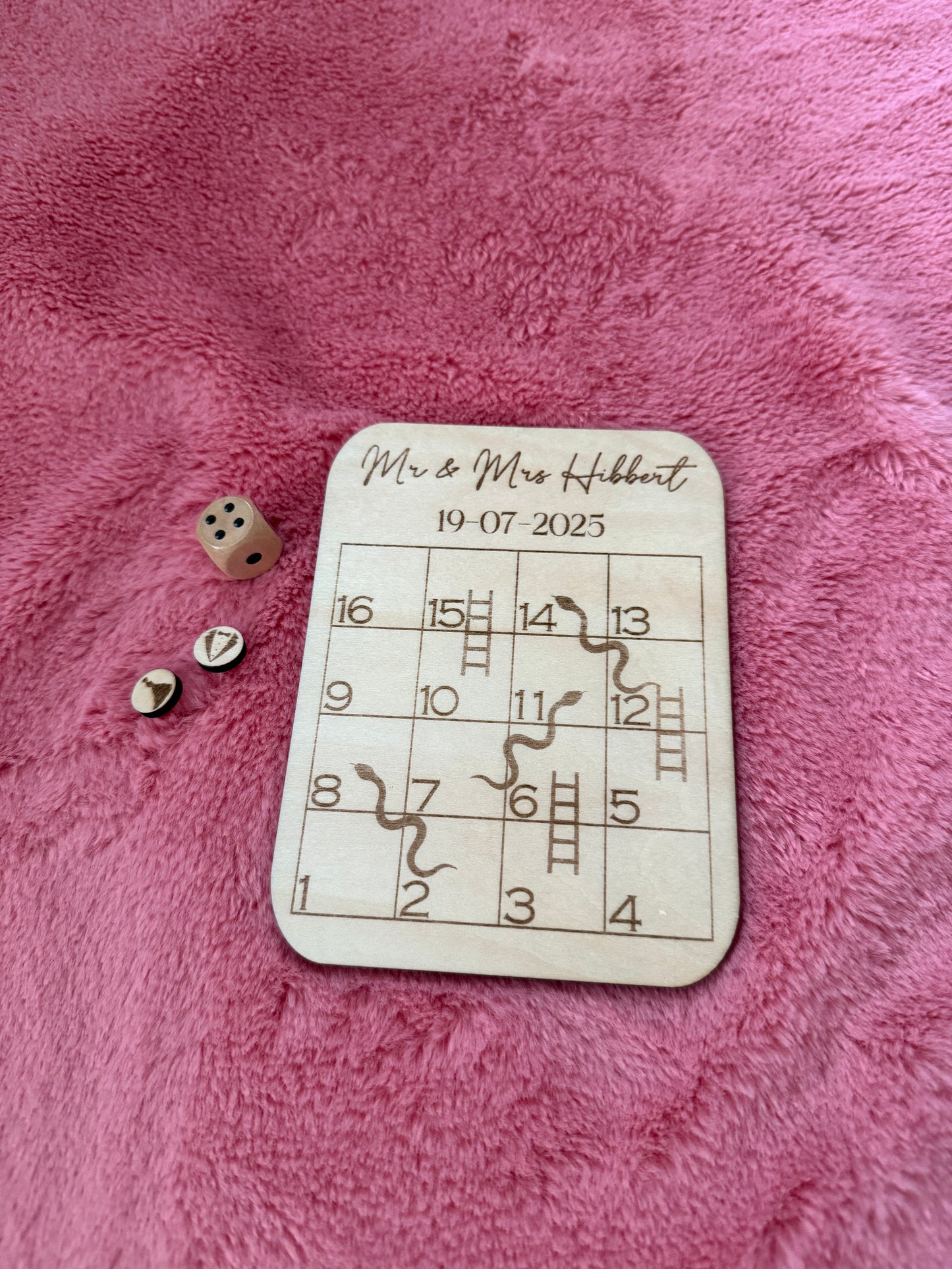Wooden snakes and ladders board game