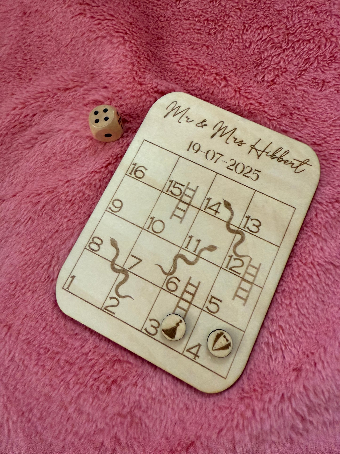 Wooden snakes and ladders board game